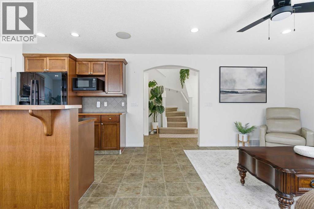 107 Cimarron Grove Circle, Okotoks, Alberta  T1S 2L9 - Photo 5 - A2294347