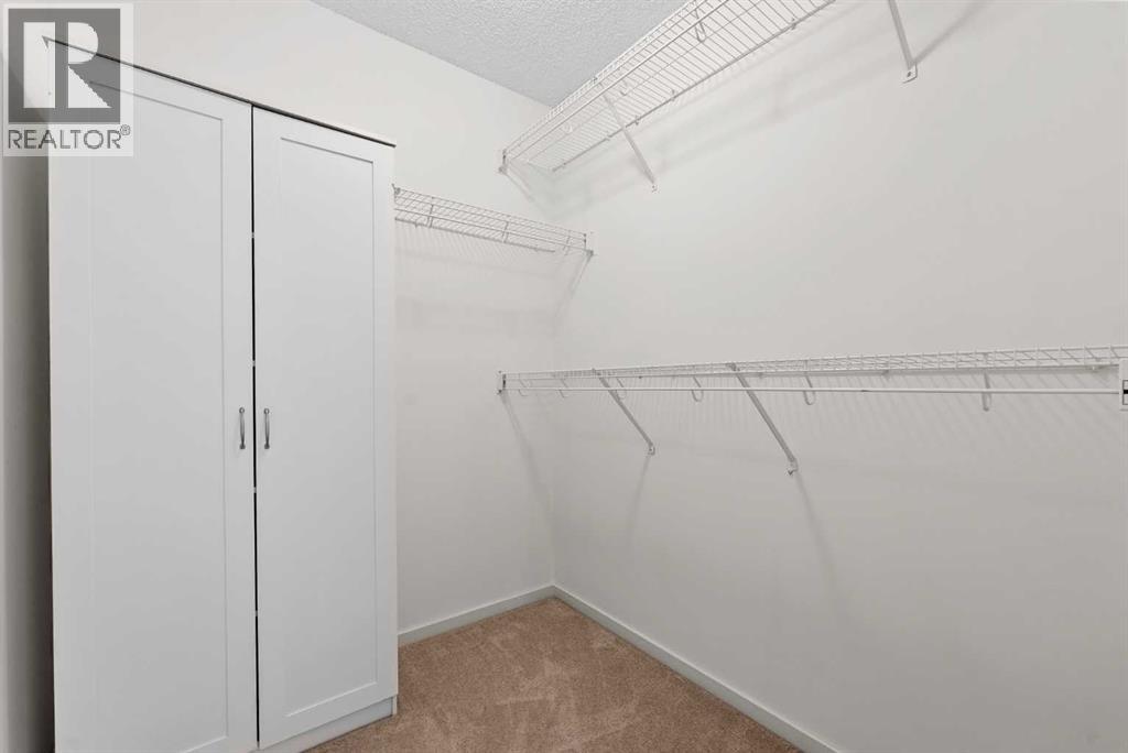 1082 Panatella Boulevard NW, Calgary, Alberta  T3K 0L2 - Photo 27 - A2293486