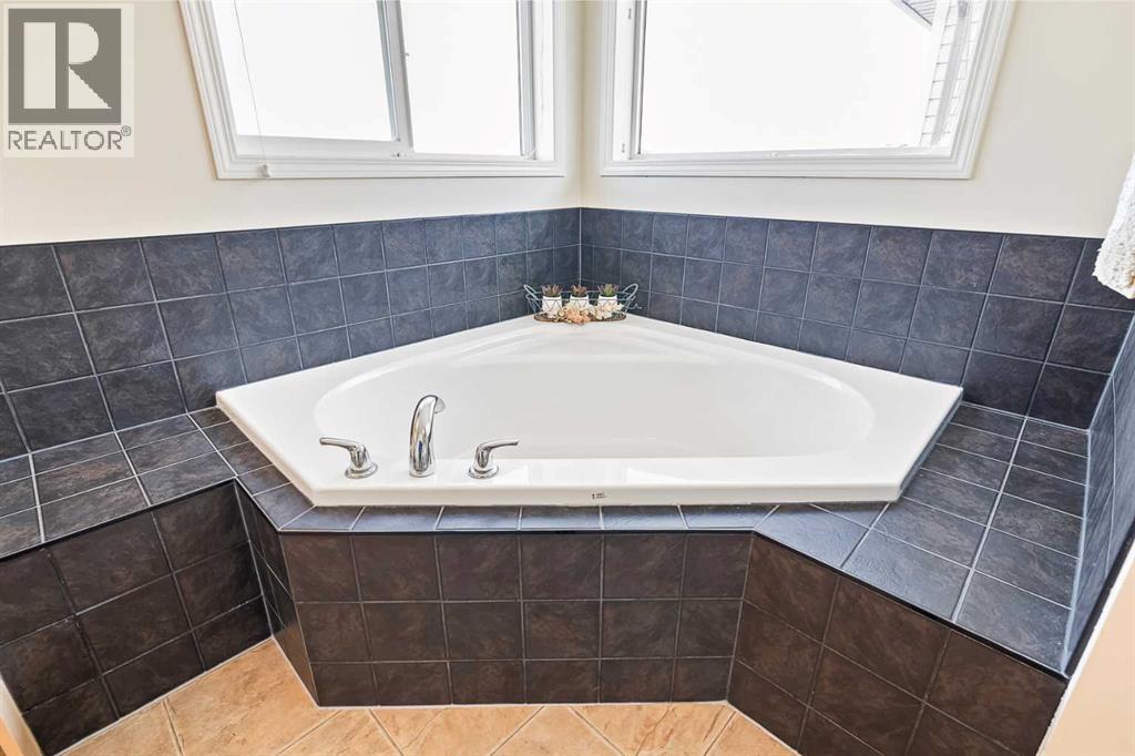 436 Cimarron Boulevard, Okotoks, Alberta  T1S 0J4 - Photo 19 - A2287310