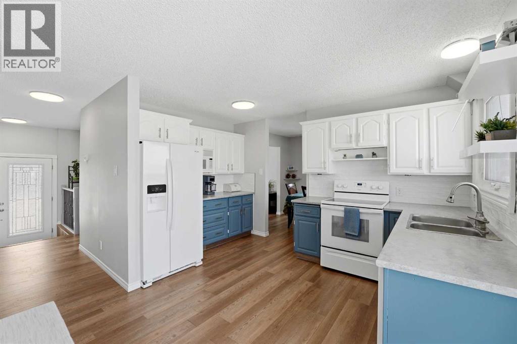 26 West Wood Drive, Didsbury, Alberta  T0M 0W0 - Photo 27 - A2298305