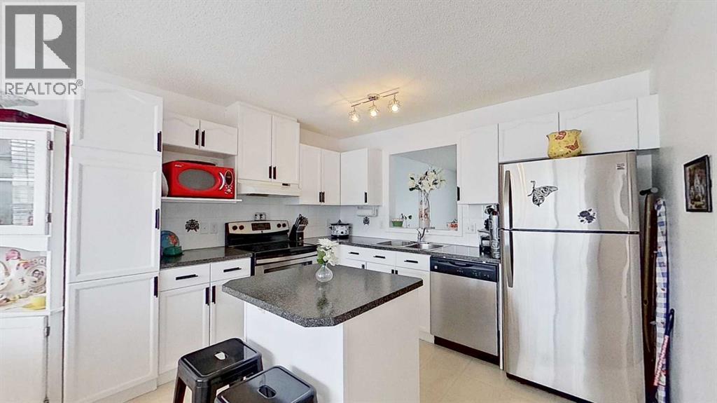 272 Rocky Ridge Court Nw, Calgary, Alberta  T3G 4S8 - Photo 9 - A2295188