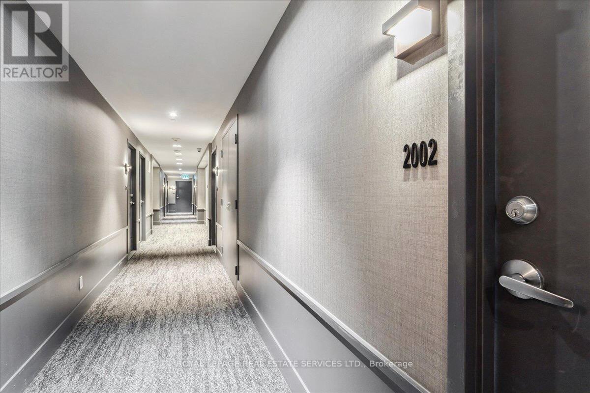 2002 - 297 Oak Walk Drive, Oakville, Ontario  L6H 3R6 - Photo 3 - W12952400