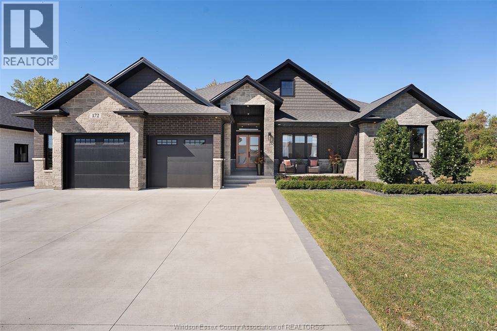 Set in the heart of charming Kingsville, just steps from the lake, this stunning ranch offers refined, resort-style living. Elegantly designed, this home showcases high-end finishes and impeccable detail throughout. Featuring 4 bedrooms and 4.5 baths, 3 of the bedrooms offer private en-suite baths, plus a fully finished basement, the layout offers flexibility for guests or a potential in-law suite. The chef-inspired kitchen is sure to impress with high end appliances, an oversized island, waterfall countertops, loads of storage and the true butler pantry. Outdoors, you will enjoy a private retreat featuring an in-ground pool, covered lanai with phantom screens, and a pool house, complete with full bath and bar area—ideal for entertaining. Situated on a fully-fenced corner lot with an attached 2+ car garage, and just minutes from premier golf courses, shopping and wineries. This home is perfectly suited for an executive buyers seeking comfort, style, and a luxury lifestyle. (id:48254)