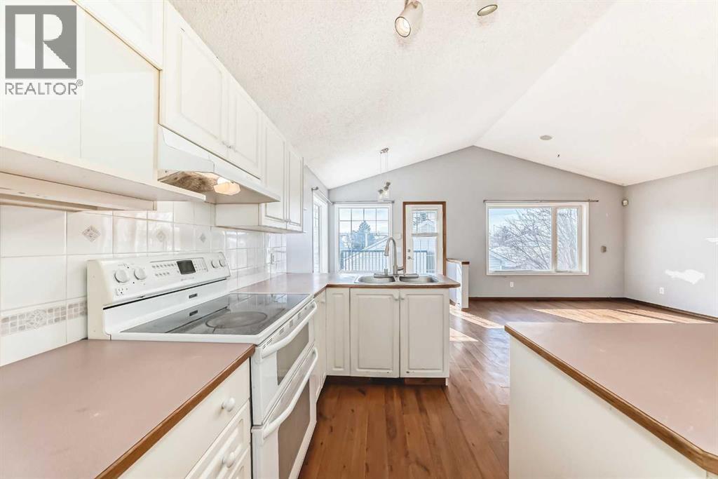 7109 Laguna Way Ne, Calgary, Alberta  T1Y 7A7 - Photo 9 - A2298295