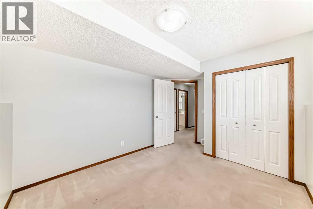 7109 Laguna Way Ne, Calgary, Alberta  T1Y 7A7 - Photo 34 - A2298295