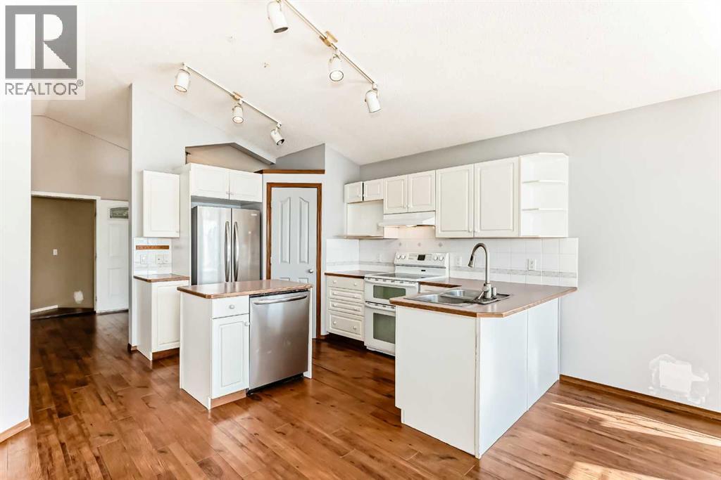 7109 Laguna Way Ne, Calgary, Alberta  T1Y 7A7 - Photo 6 - A2298295