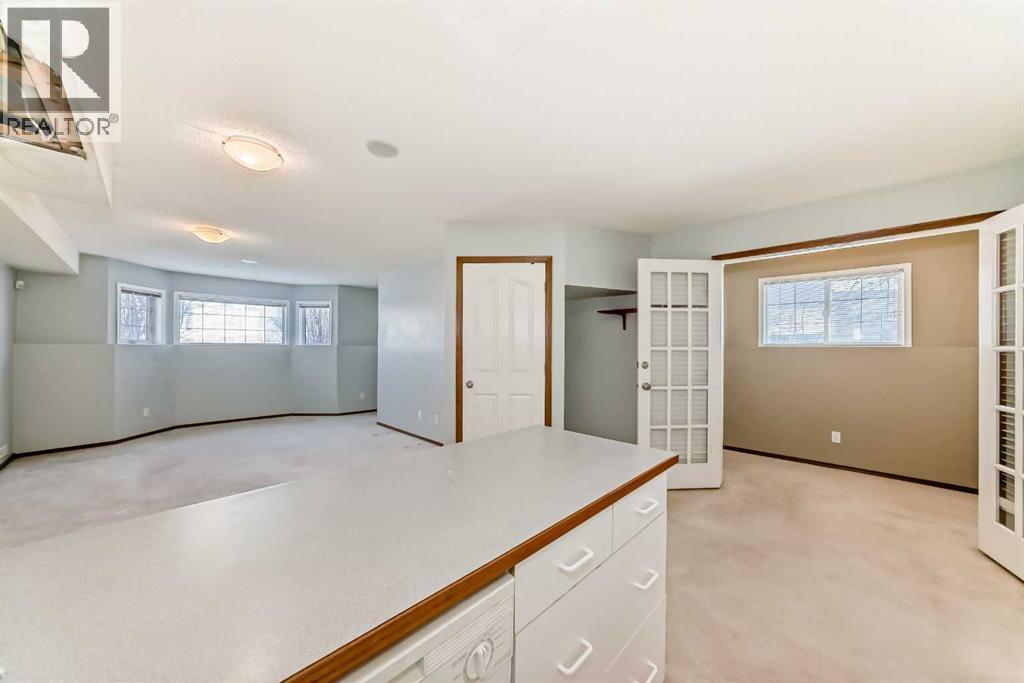 7109 Laguna Way Ne, Calgary, Alberta  T1Y 7A7 - Photo 29 - A2298295