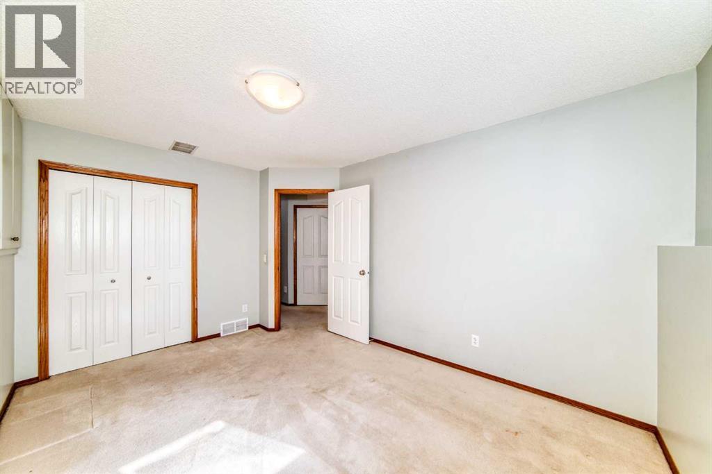 7109 Laguna Way Ne, Calgary, Alberta  T1Y 7A7 - Photo 31 - A2298295