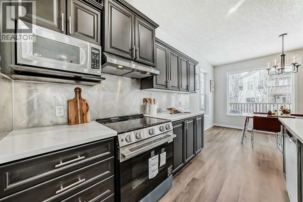 21 Panamount Row Nw, Calgary, Alberta  T3K 0C6 - Photo 4 - A2298358