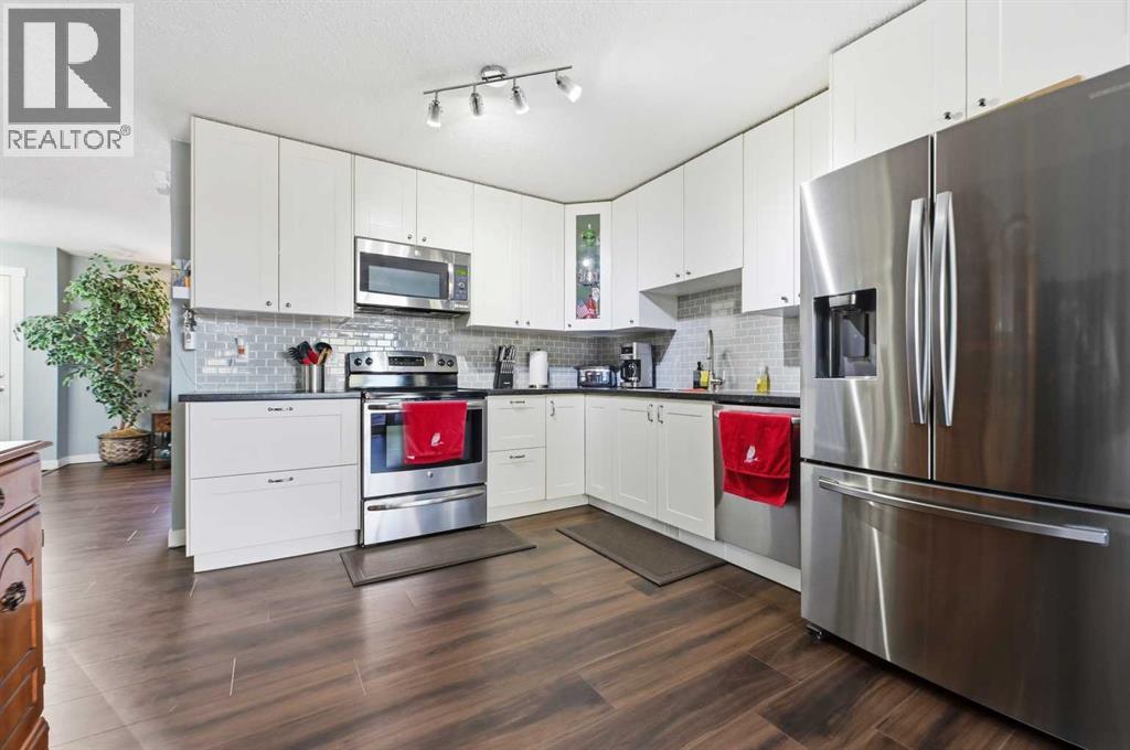 24 Huntstrom Road NE, Calgary, Alberta  T2K 5W3 - Photo 6 - A2297219