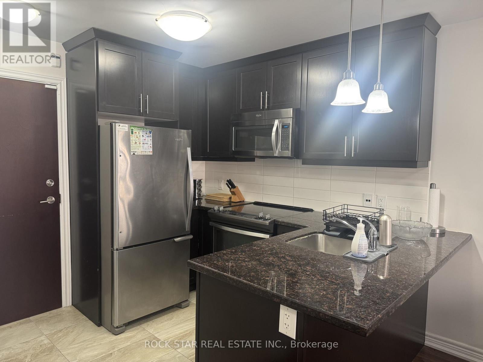 305 - 73 Washington Avenue, Oakville, Ontario  L6K 1W5 - Photo 2 - W12953288