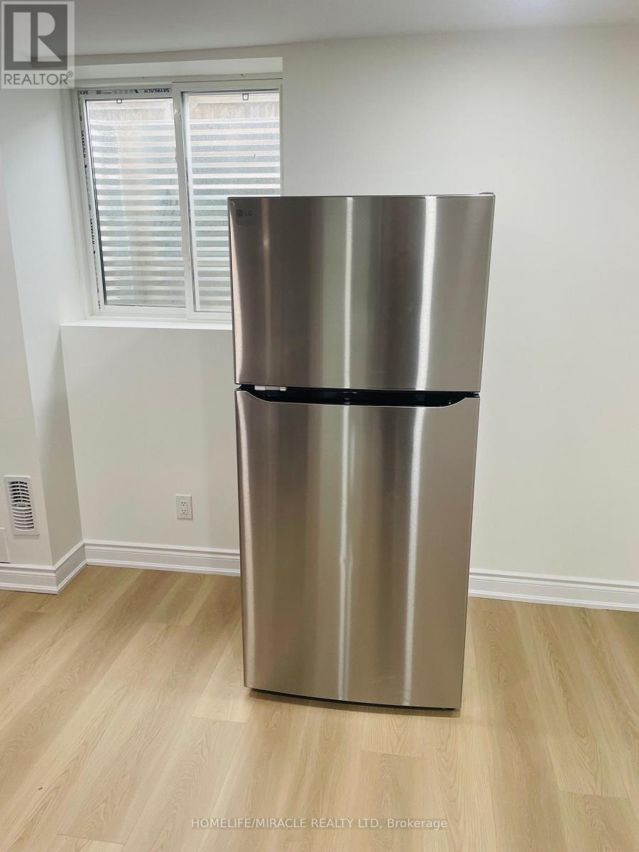 Bsmt - 1-2341 Canonridge Circle, Oakville, Ontario  L6M 4T9 - Photo 3 - W12953342