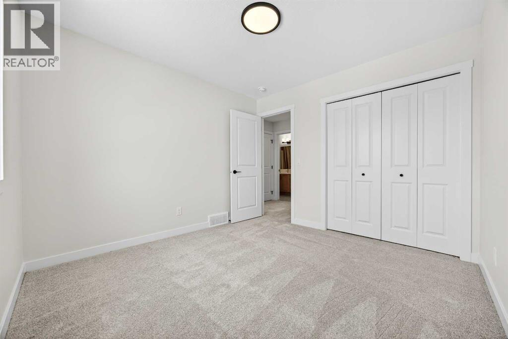 52 Fireside Common Sw, Cochrane, Alberta  T4C 3E1 - Photo 38 - A2286463