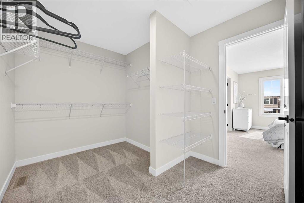 52 Fireside Common Sw, Cochrane, Alberta  T4C 3E1 - Photo 36 - A2286463