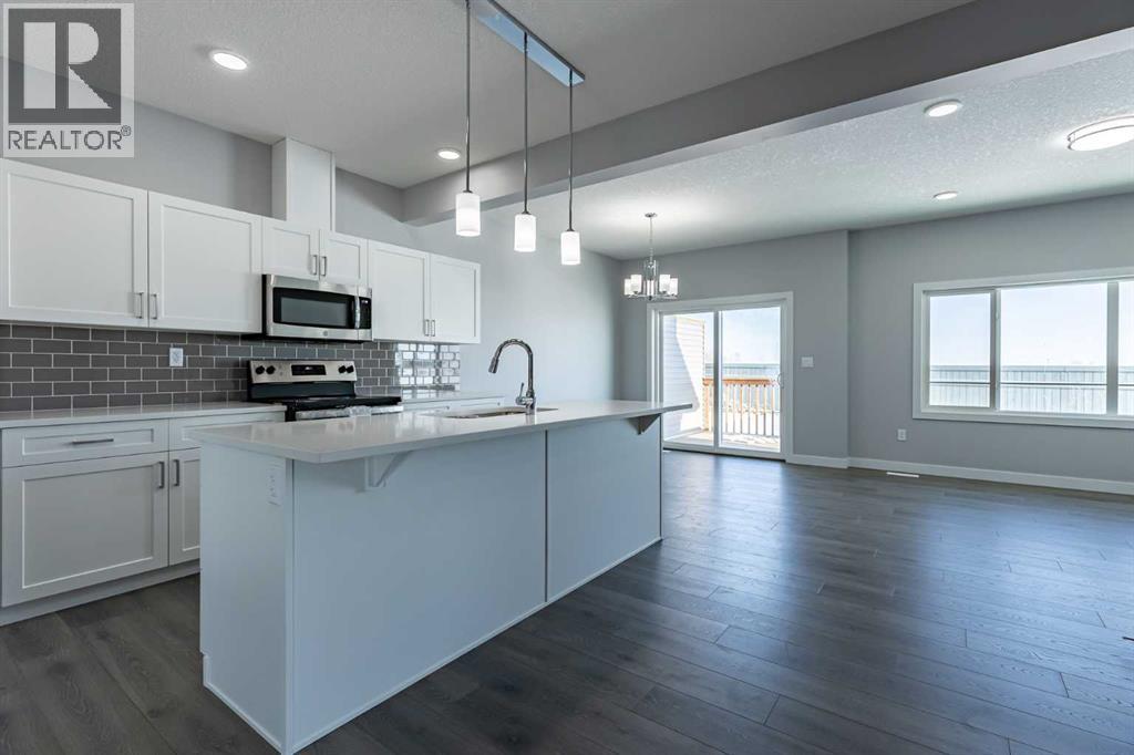 7 Heritage Point, Cochrane, Alberta  T4C 3K7 - Photo 6 - A2291321