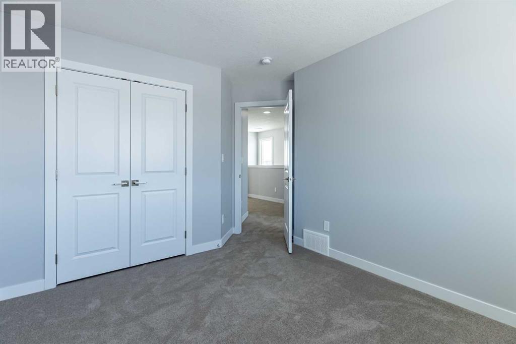 7 Heritage Point, Cochrane, Alberta  T4C 3K7 - Photo 24 - A2291321