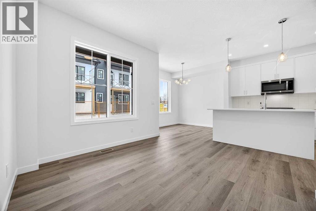 66 Creekside Way Sw, Calgary, Alberta  T2X 6E2 - Photo 6 - A2292722