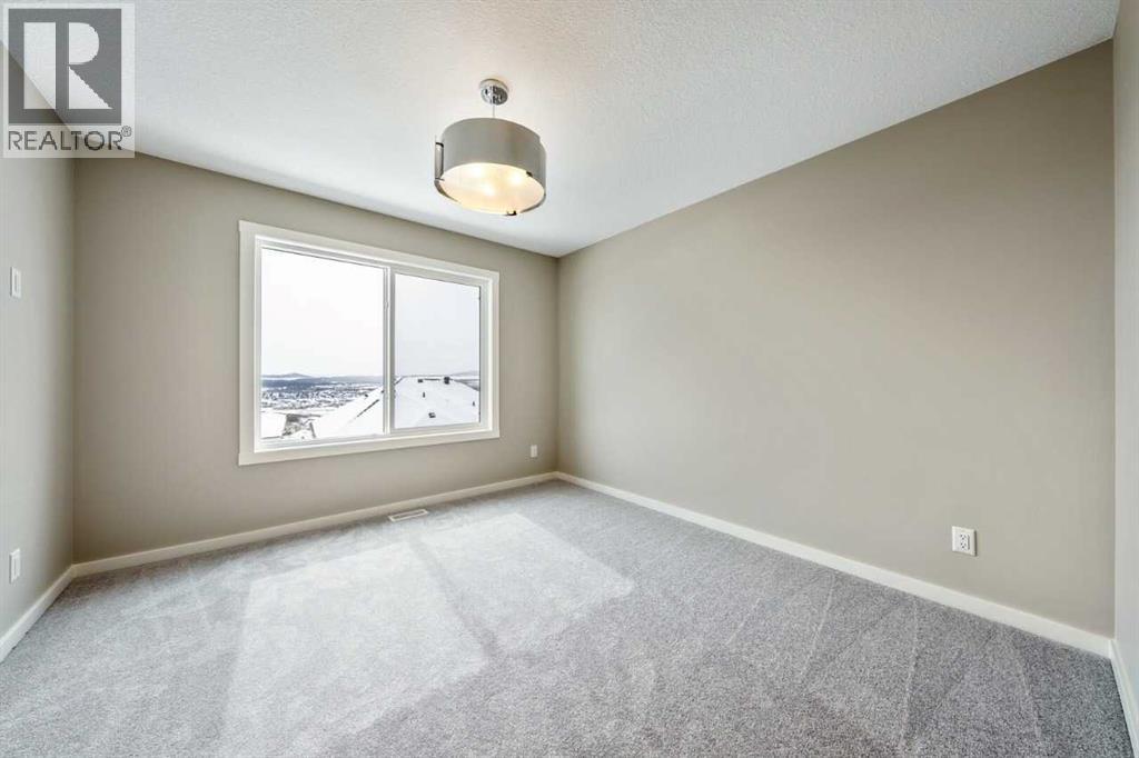 370 Heritage Boulevard, Cochrane, Alberta  T4C 0L3 - Photo 11 - A2294884