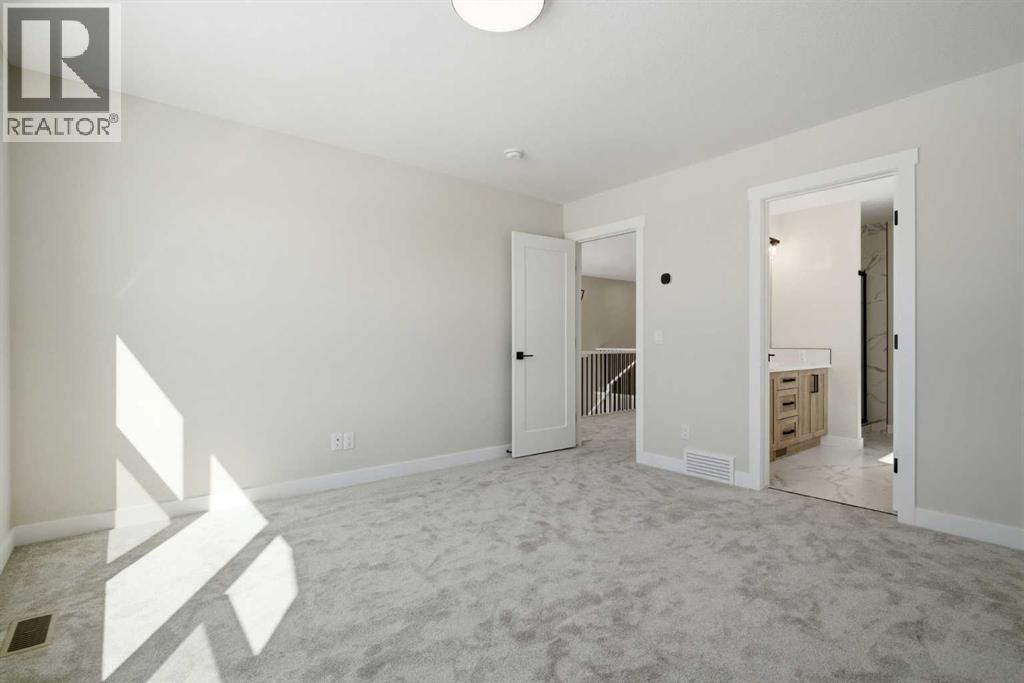 302 Kinniburgh Loop, Chestermere, Alberta  T1X 3C3 - Photo 23 - A2289506