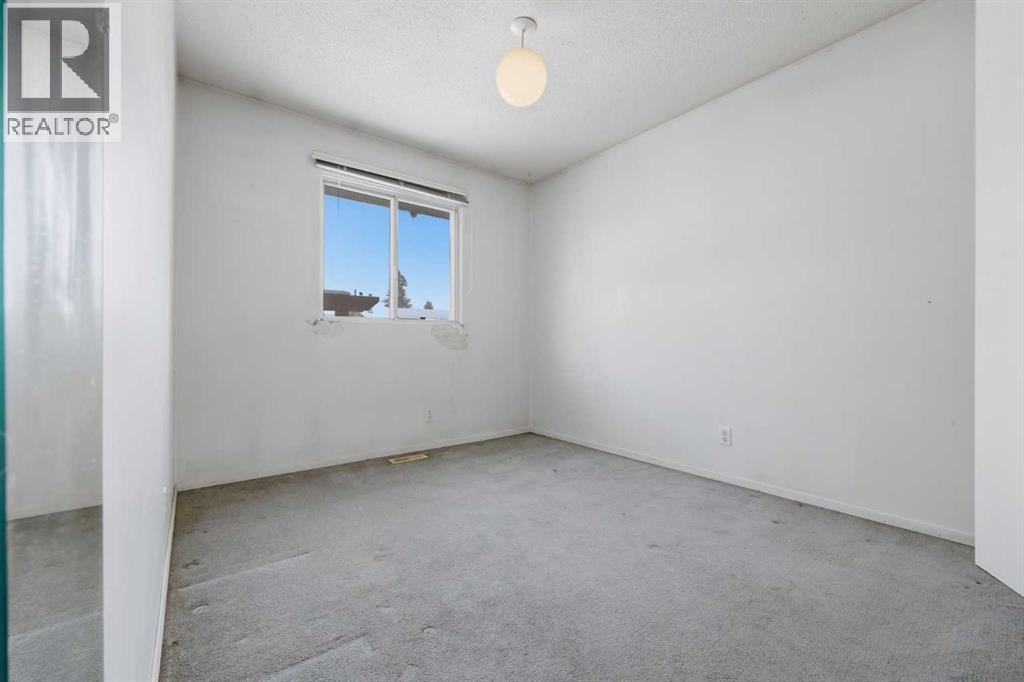 4911 Marcombe Road NE, Calgary, Alberta  T2A 3G4 - Photo 18 - A2297127