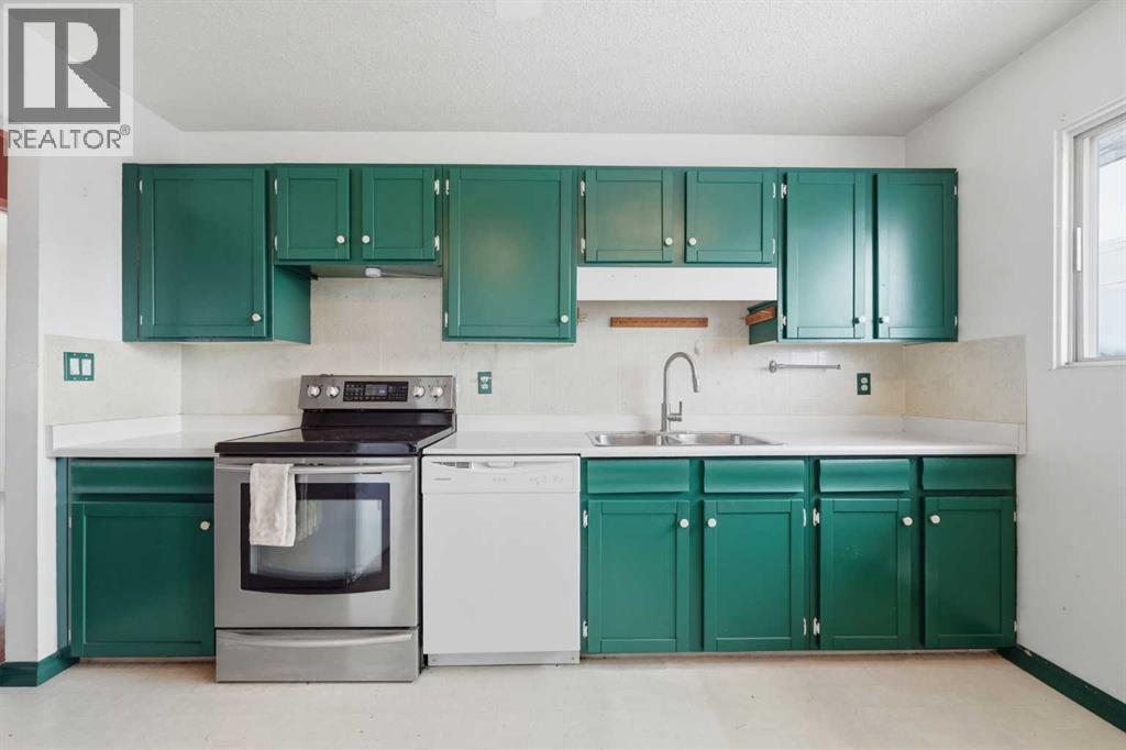 4911 Marcombe Road NE, Calgary, Alberta  T2A 3G4 - Photo 11 - A2297127