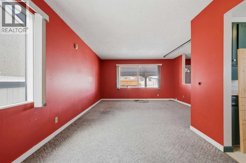 4911 Marcombe Road NE, Calgary, Alberta  T2A 3G4 - Photo 9 - A2297127