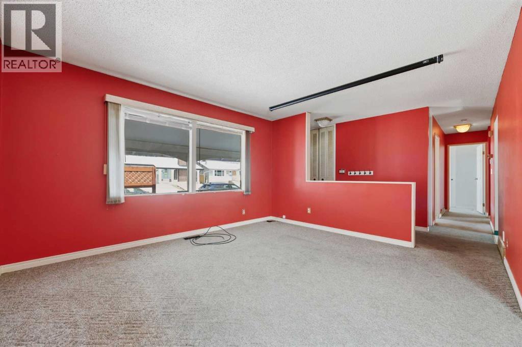 4911 Marcombe Road NE, Calgary, Alberta  T2A 3G4 - Photo 5 - A2297127