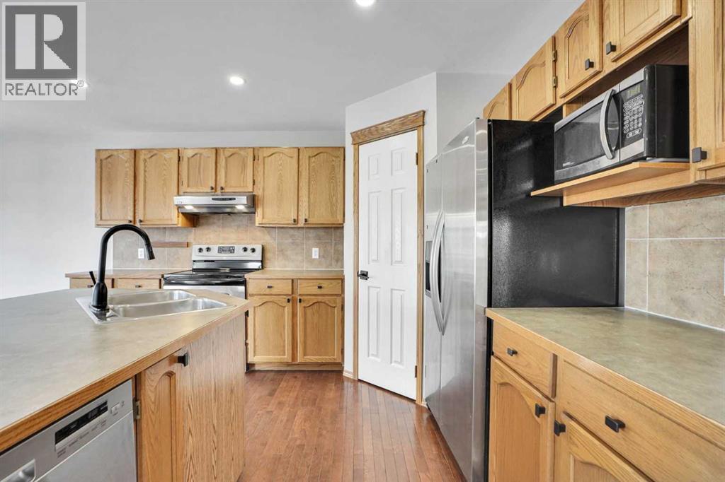 221 Tuscany Meadows Heights NW, Calgary, Alberta  T3L 2L2 - Photo 9 - A2297502