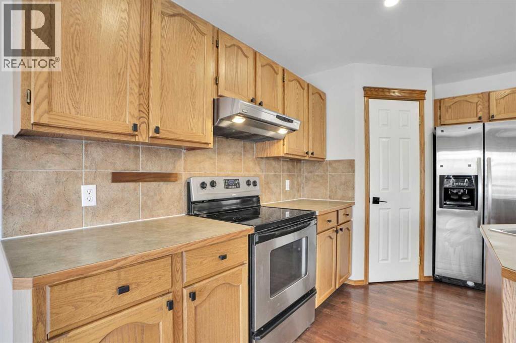 221 Tuscany Meadows Heights NW, Calgary, Alberta  T3L 2L2 - Photo 10 - A2297502