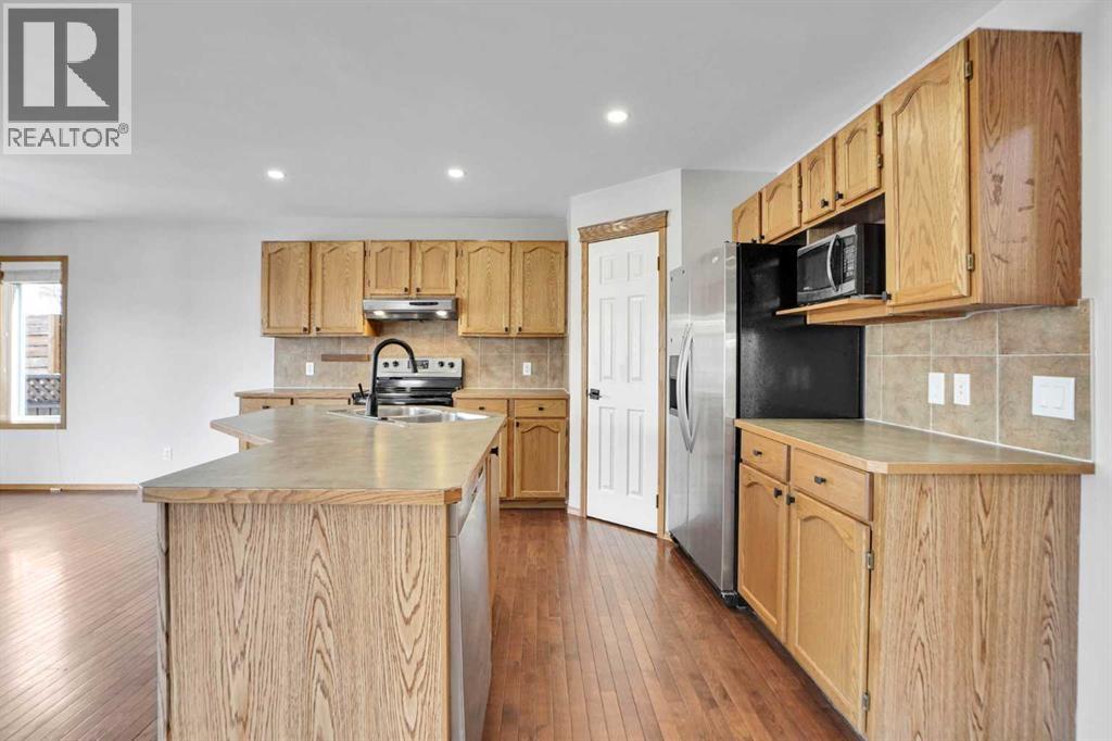 221 Tuscany Meadows Heights NW, Calgary, Alberta  T3L 2L2 - Photo 7 - A2297502