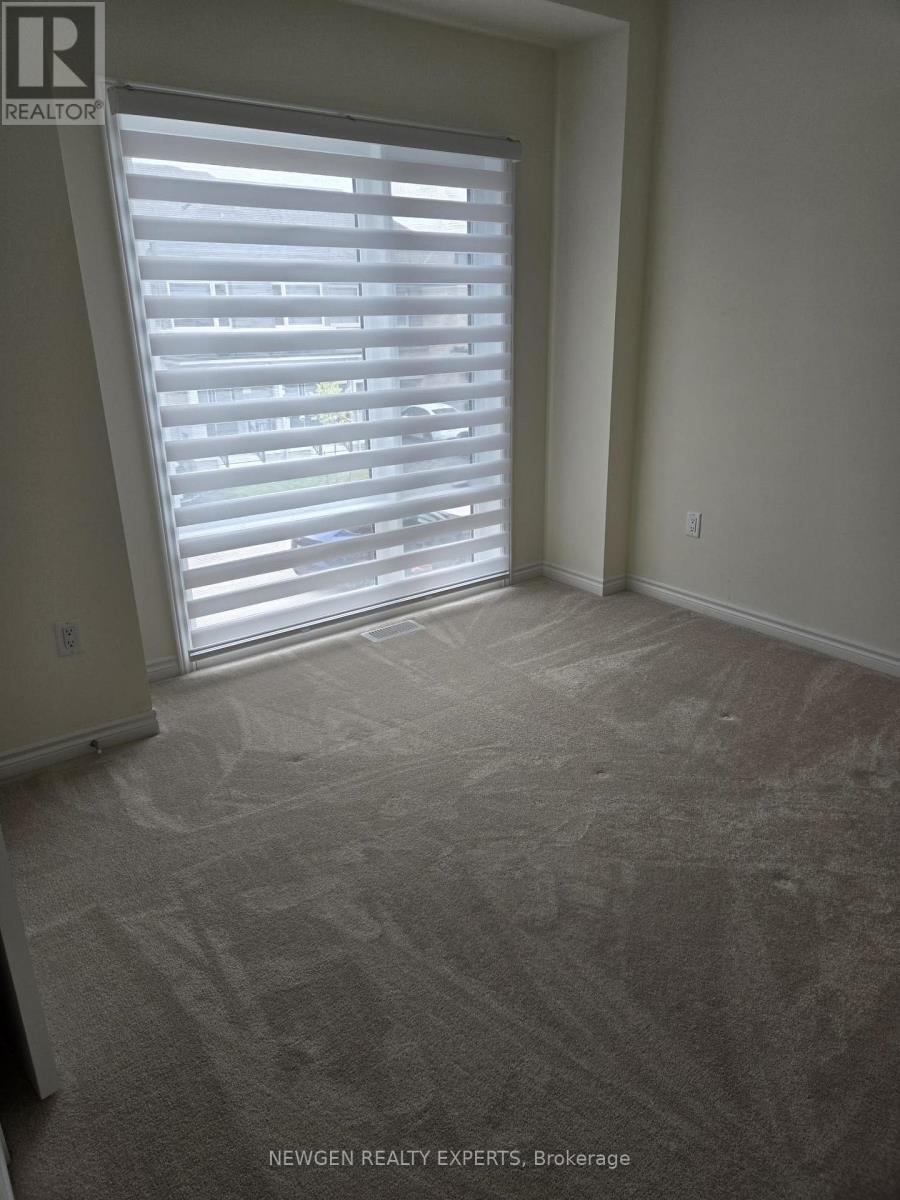 27 Donald Ficht Crescent, Brampton, Ontario  L7A 5H9 - Photo 6 - W12954154