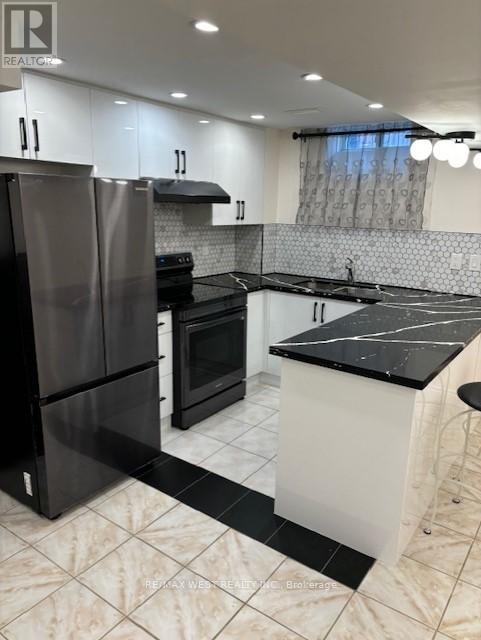 Bsmt - 77 Norman Wesley Way, Toronto, Ontario  M3M 3H3 - Photo 2 - W12954158