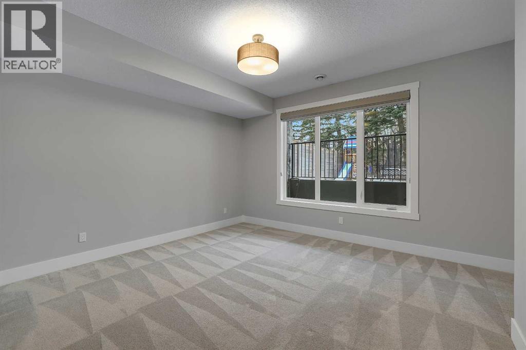 106 Rock Lake Heights NW, Calgary, Alberta  T3G 0G3 - Photo 17 - A2298601