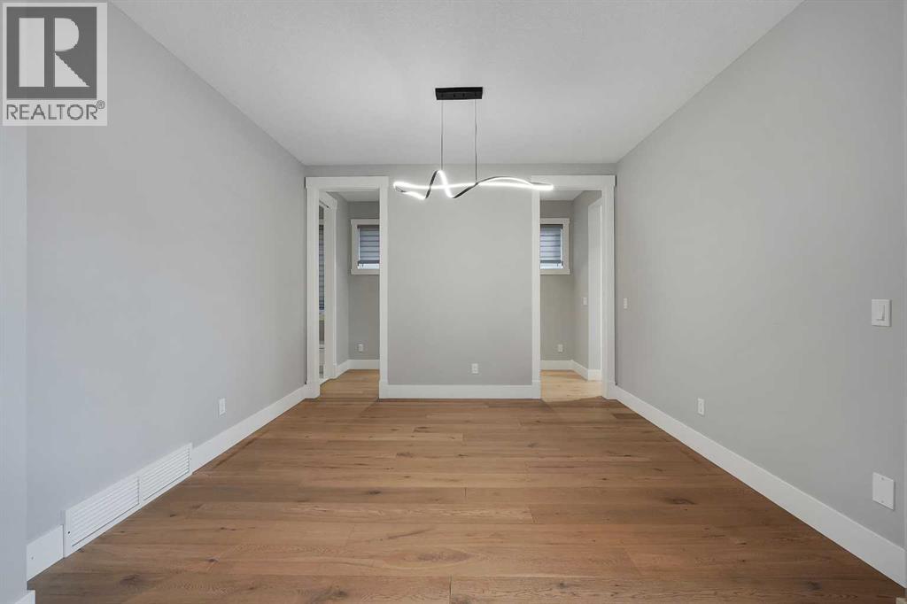 106 Rock Lake Heights NW, Calgary, Alberta  T3G 0G3 - Photo 5 - A2298601