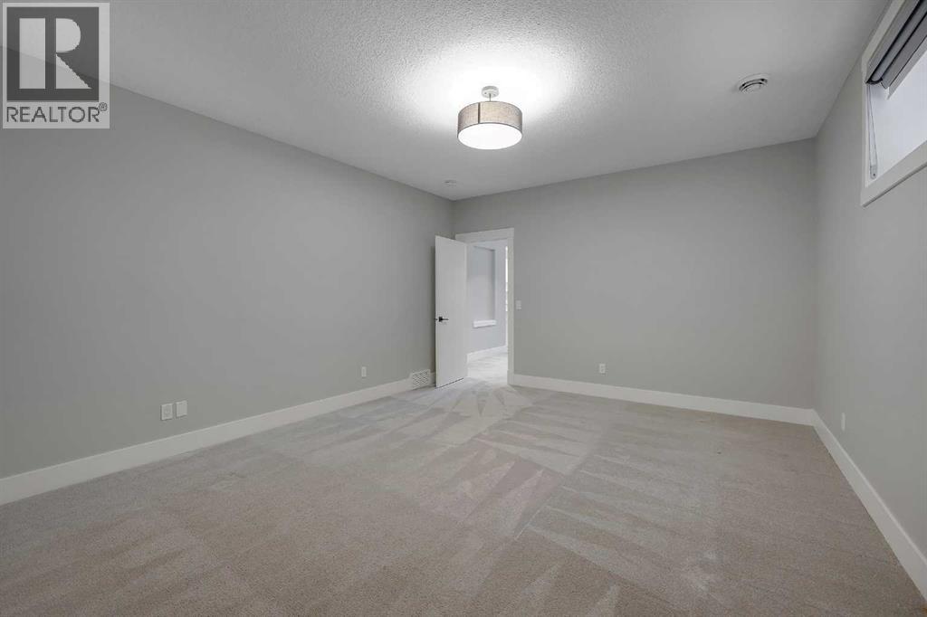 106 Rock Lake Heights NW, Calgary, Alberta  T3G 0G3 - Photo 27 - A2298601