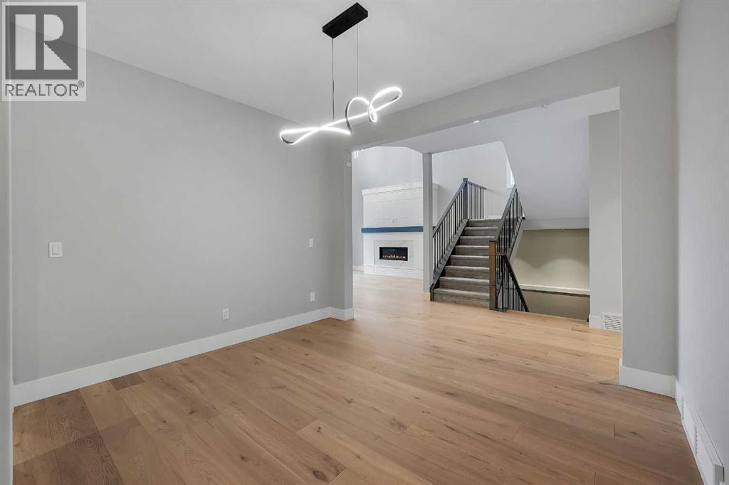 106 Rock Lake Heights NW, Calgary, Alberta  T3G 0G3 - Photo 4 - A2298601