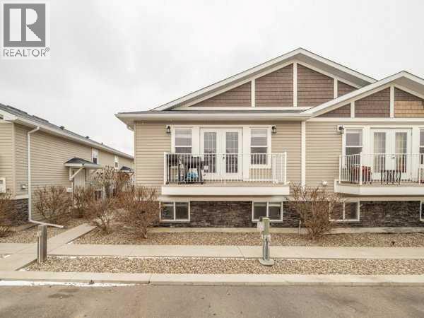 2, 23 Cougar Cove N, Lethbridge, Alberta  T1H 5V4 - Photo 1 - A2293643
