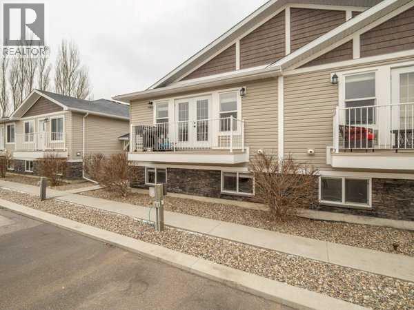 2, 23 Cougar Cove N, Lethbridge, Alberta  T1H 5V4 - Photo 3 - A2293643