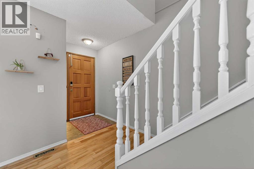 103 Macewan Drive NW, Calgary, Alberta  T3K 2G2 - Photo 4 - A2296101