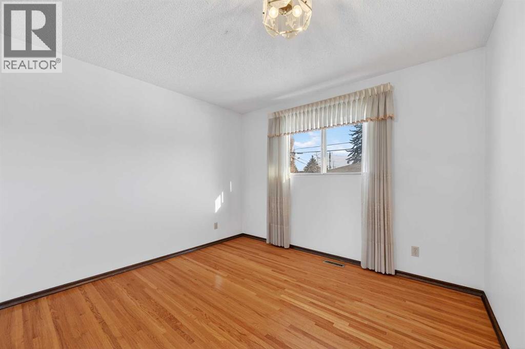 7228 Huntridge Hill NE, Calgary, Alberta  T2K 4A5 - Photo 14 - A2289367