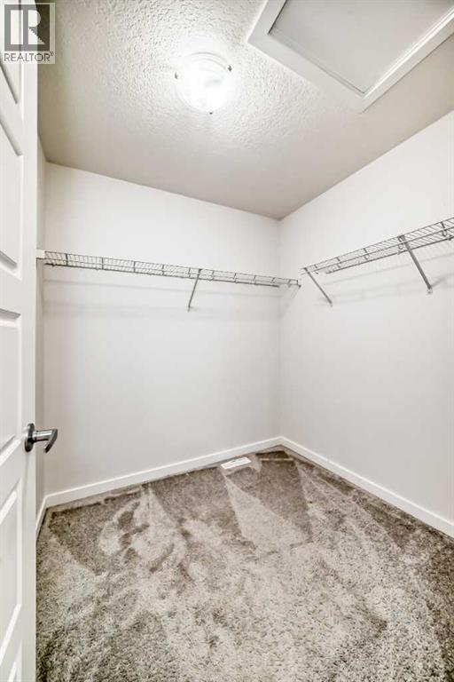 165 Savanna Passage Ne, Calgary, Alberta  T3J 2J7 - Photo 24 - A2279454
