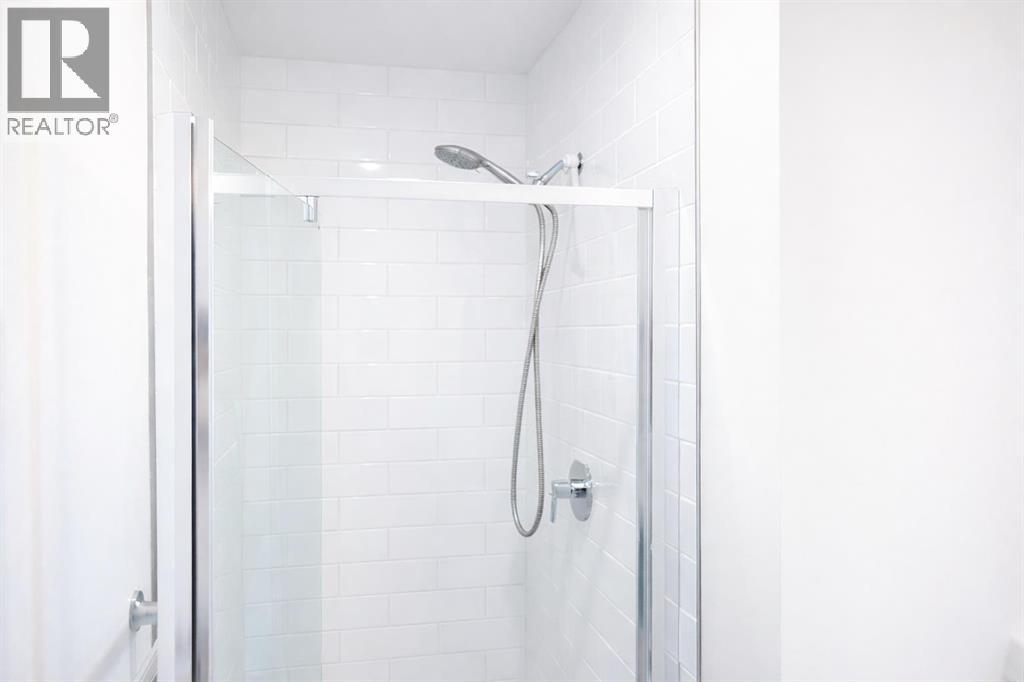 405, 205 Spring Creek Common Sw, Calgary, Alberta  T3H 6H4 - Photo 25 - A2295322