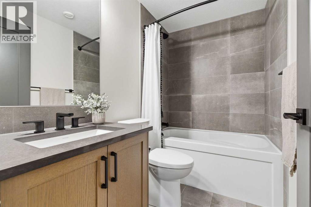 42 Creekside Avenue Sw, Calgary, Alberta  T2X 4A9 - Photo 45 - A2285114