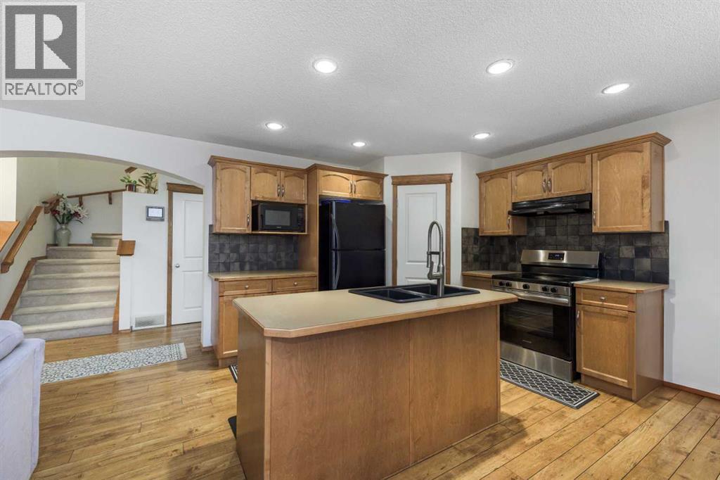 74 Tuscany Springs Hill Nw, Calgary, Alberta  T3L 3E4 - Photo 5 - A2286017