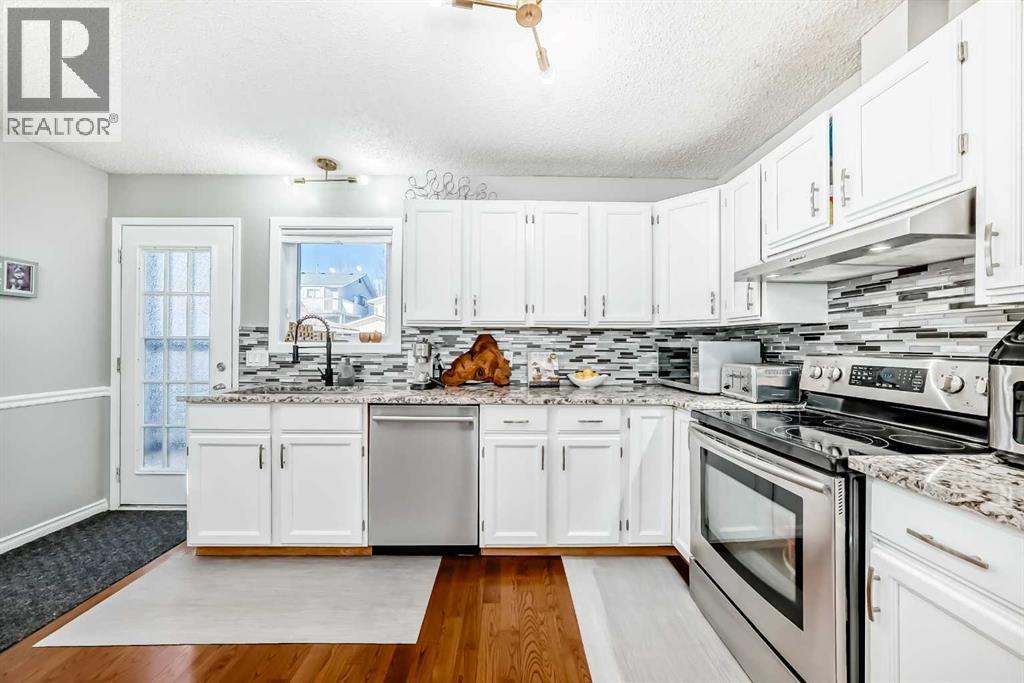 71 Macewan Glen Road NW, Calgary, Alberta  T3K 2J3 - Photo 7 - A2294998