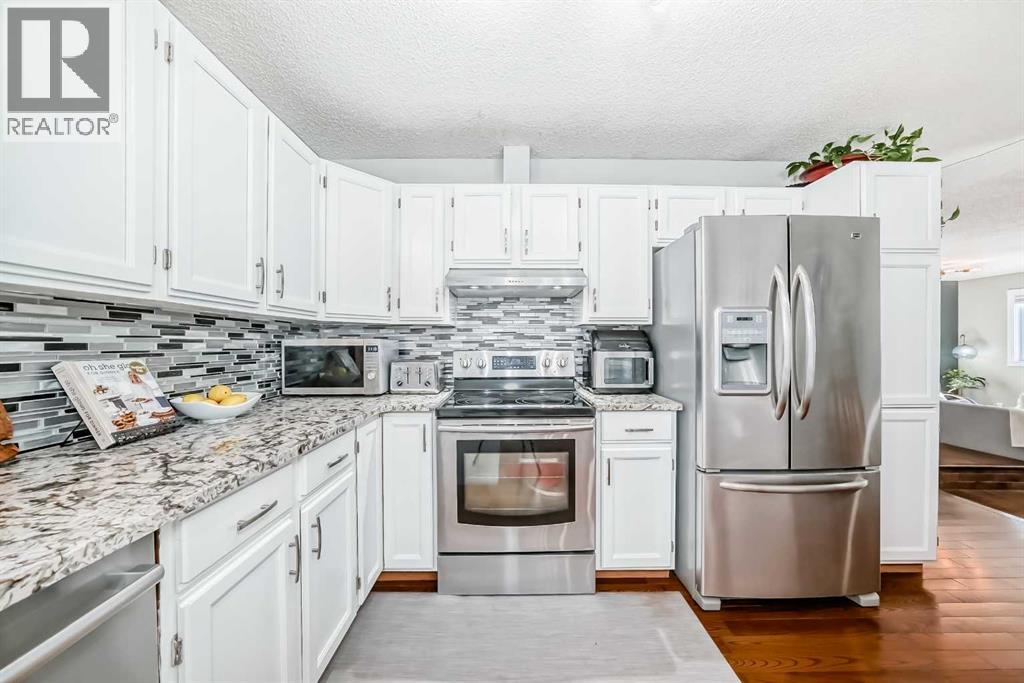 71 Macewan Glen Road NW, Calgary, Alberta  T3K 2J3 - Photo 6 - A2294998