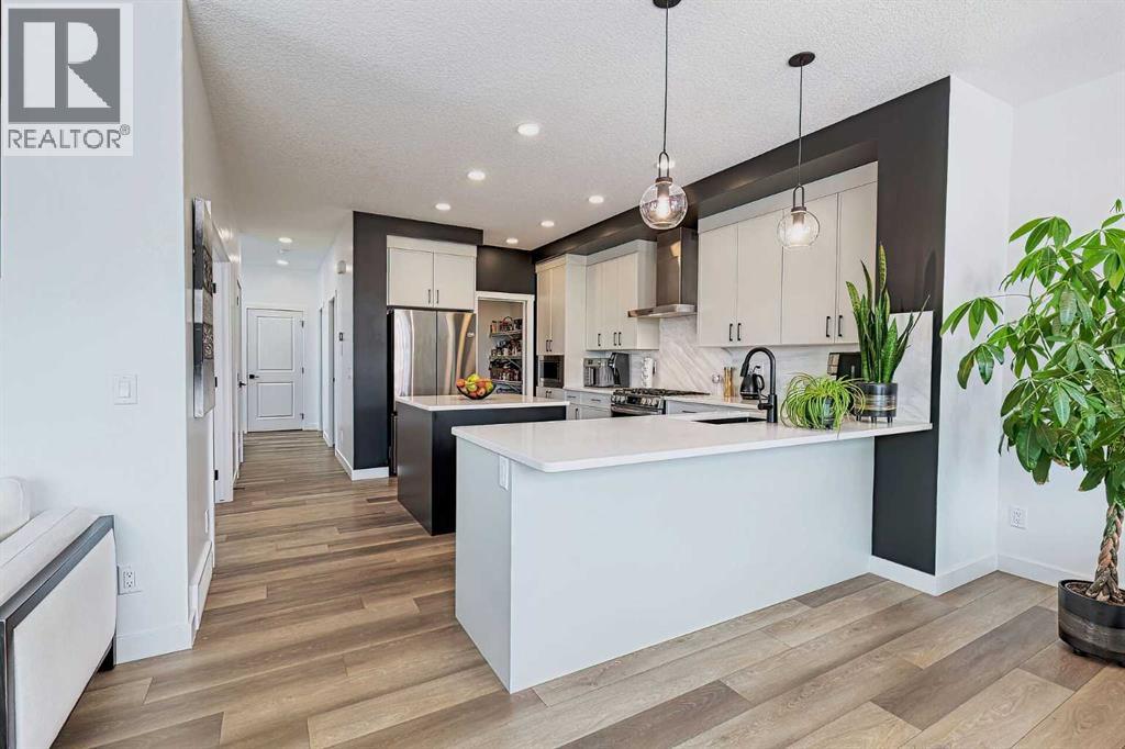 3 Saddlebred Court, Cochrane, Alberta  T4C 3B5 - Photo 6 - A2295839