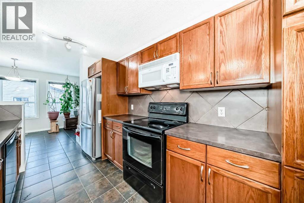 9275 Saddlebrook Drive NE, Calgary, Alberta  T3J 5M5 - Photo 5 - A2298694