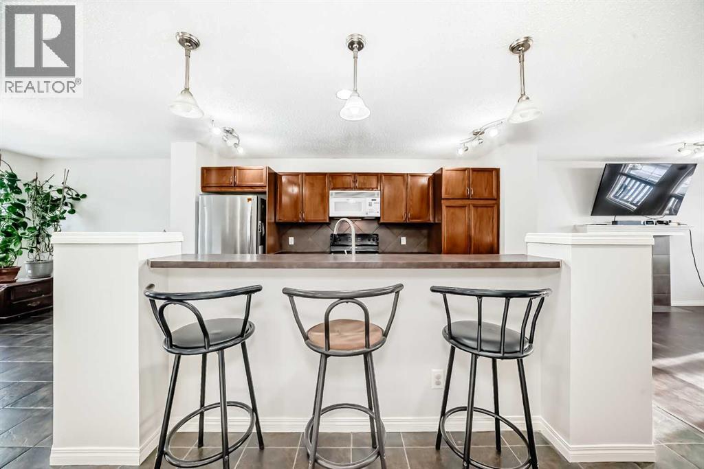 9275 Saddlebrook Drive NE, Calgary, Alberta  T3J 5M5 - Photo 9 - A2298694