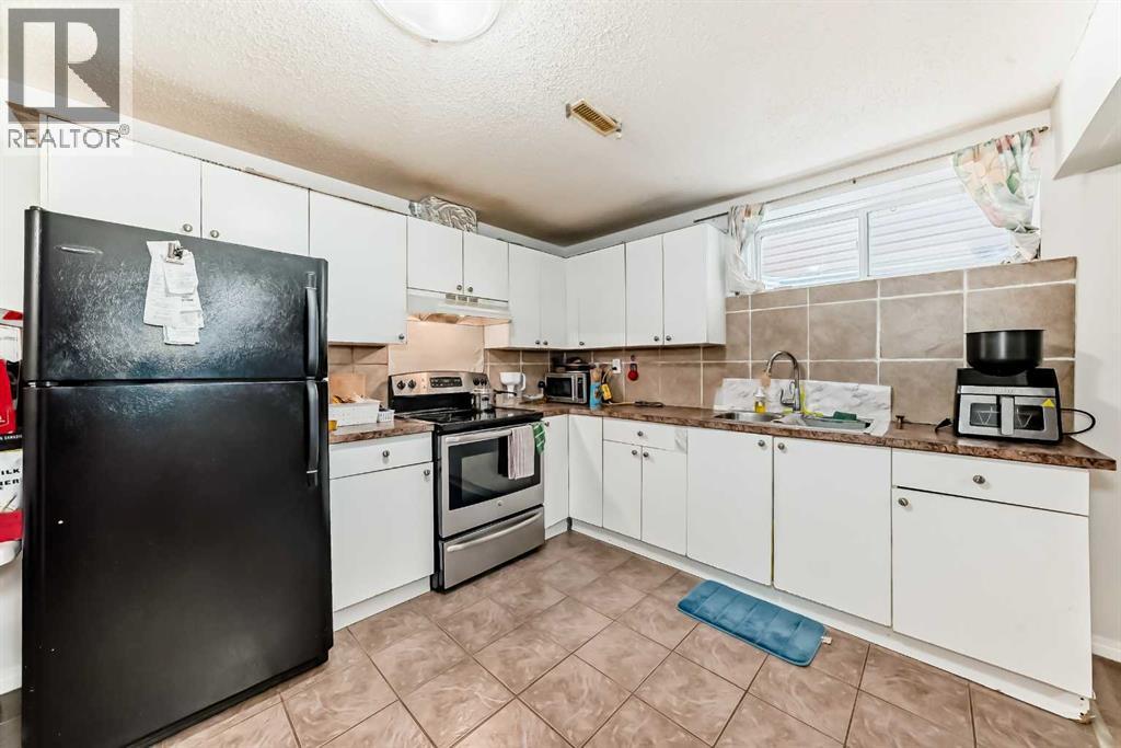 9275 Saddlebrook Drive NE, Calgary, Alberta  T3J 5M5 - Photo 19 - A2298694